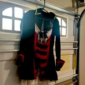 This is a pirate dress size, medium small. It has a petticoat and  zipper velvet